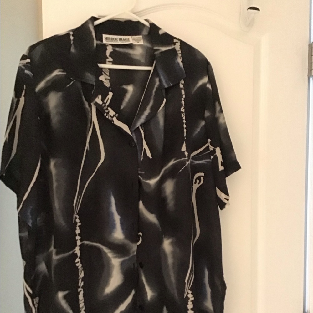 Mirror Image black, white and blue short sleeve top.